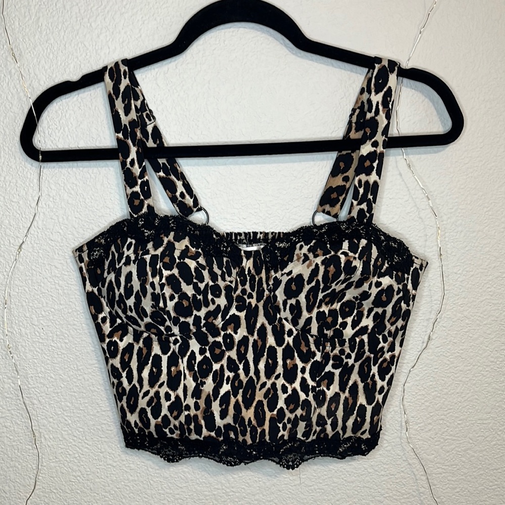 *Free Gift W Purchase* Cheetah print corset with black lace bottom. Size medium.